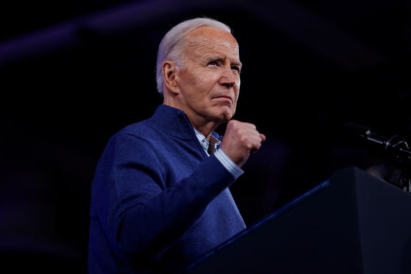Biden signs spending bill to avert partial government shutdown, White